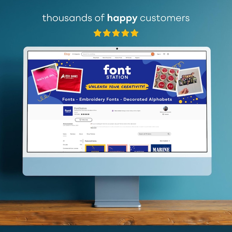 May include: A computer monitor displays the Etsy shop "Font Station." The shop's banner features the text "font STATION" and "UNLEASH YOUR CREATIVITY!" with examples of fonts and embroidery. The screen also shows customer reviews and the words "A RED SHIRT."