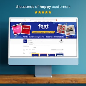 May include: A computer monitor displays the Etsy shop "Font Station." The shop's banner features the text "font STATION" and "UNLEASH YOUR CREATIVITY!" with examples of fonts and decorated alphabets. The screen shows customer reviews and featured items.