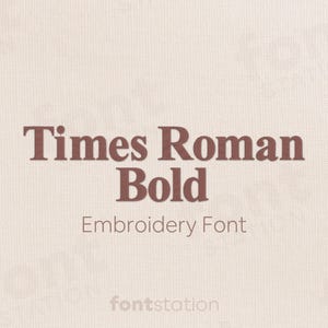 May include: The words "Times Roman Bold" in a dark brown font are centered on a light beige background. Below the text is "Embroidery Font" in a smaller, lighter brown font. The fontstation logo is at the bottom.