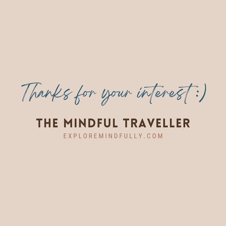 May include: Text that reads "Thanks for your interest!" in blue cursive font. Below the text is "THE MINDFUL TRAVELLER" in brown font and "EXPLOREMINDFULLY.COM" in smaller brown font.