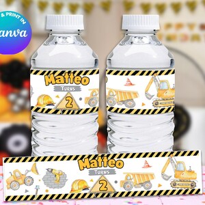 May include: Construction themed water bottle labels with yellow, black, and white stripes. The labels feature a cartoon excavator, dump truck, and a hard hat. The text on the label reads "Matteo Turns 2".