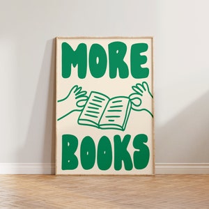 Peut inclure: Une affiche verte et blanche avec le texte "MORE BOOKS" en caract&egrave;res gras et ludiques. Deux mains vertes tiennent un livre ouvert au centre de l'affiche.