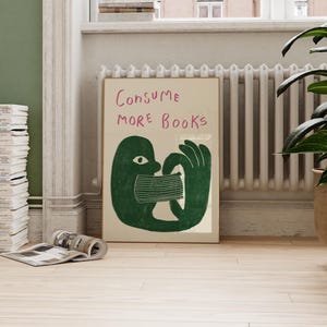 May include: A green illustration of a person consuming a book with the text "Consume More Books" in pink lettering.
