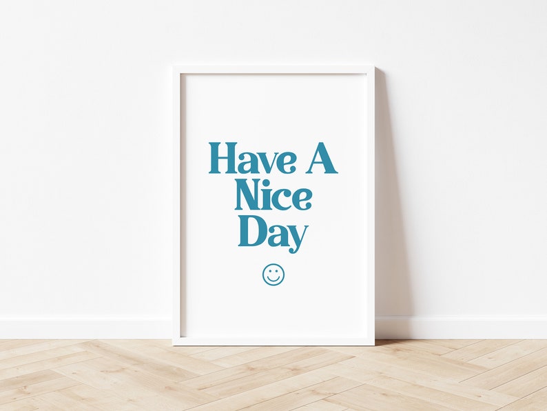 May include: White framed poster with the text "Have A Nice Day" in blue lettering and a blue smiley face.