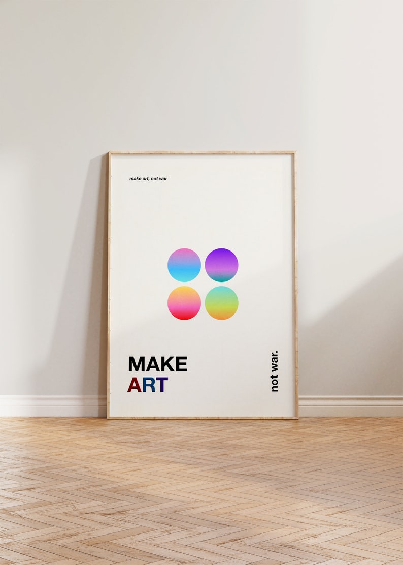Pode incluir: Um p&ocirc;ster emoldurado com fundo branco e um design colorido. O p&ocirc;ster apresenta quatro c&iacute;rculos degrad&ecirc; em rosa, azul, amarelo e roxo. O texto "MAKE ART not war." est&aacute; escrito em letras pretas.