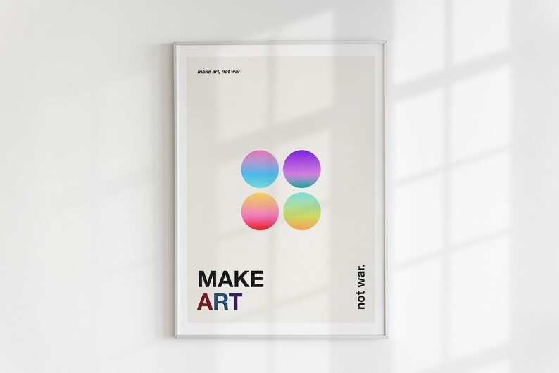 Pode incluir: Um p&ocirc;ster emoldurado com fundo branco e o texto "make art, not war." Quatro c&iacute;rculos coloridos s&atilde;o dispostos em um padr&atilde;o quadrado. O texto "MAKE ART" est&aacute; abaixo dos c&iacute;rculos, e o texto "not war." est&aacute; &agrave; direita dos c&iacute;rculos.