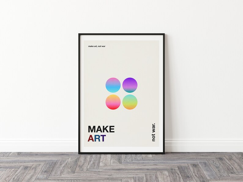 Pode incluir: Um p&ocirc;ster emoldurado com fundo branco e texto preto que diz "make art, not war." O p&ocirc;ster apresenta quatro c&iacute;rculos coloridos dispostos em um padr&atilde;o quadrado. O texto "MAKE ART" est&aacute; abaixo dos c&iacute;rculos, e o texto "not war." est&aacute; &agrave; direita dos c&iacute;rculos.