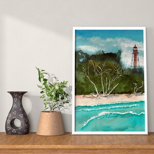 Lighthouse on Sanibel Island by Old Driftwood Trees