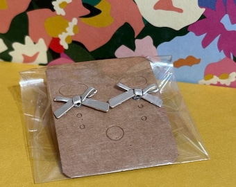 mini silver stud bow earrings