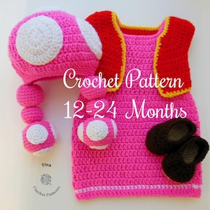 SCHEMA ALL'UNCINETTO per il vestito di Halloween di Baby Toadette in inglese. Il modello PDF include cappello, vestito, gilet e scarpe. Taglie 12–18 / 18–24 mesi.