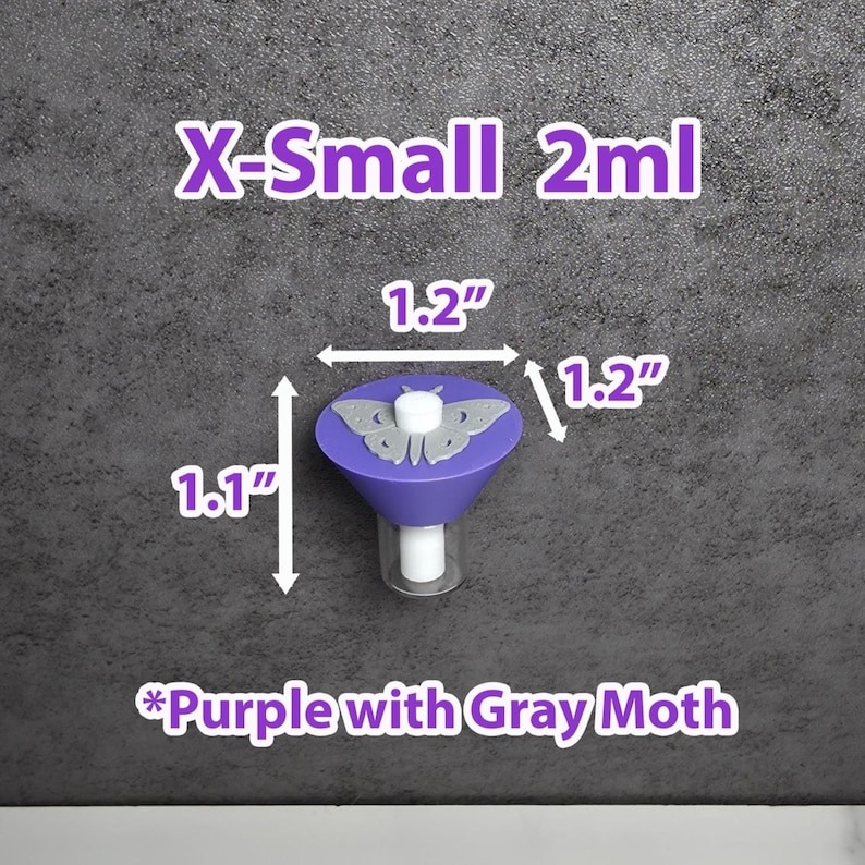 May include: A purple funnel with a gray moth design, measuring 3 cm wide and 2.8 cm tall. The text "X-Small 2ml" and "*Purple with Gray Moth" are displayed. The funnel is on a gray background.