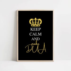 May include: Black and gold framed print with the text "Keep Calm and Make Dua" with a gold crown above the text.