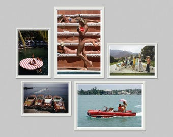May include: A collection of five framed photographs featuring scenes of leisure and recreation. Images include people sunbathing, boating, and enjoying outdoor activities. The photographs are displayed against a neutral gray background.