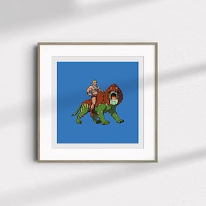 May include: Framed print featuring a pixelated illustration of a muscular figure riding a green and brown beast with an open mouth. The background is a solid blue color. The artwork is displayed in a wooden frame.