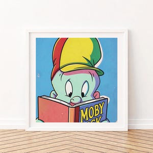 May include: A framed print featuring a cartoon character with teal skin wearing a yellow, red, and green hat, reading a book titled "MOBY DICK" on a blue background. The artwork is in a pop art style.