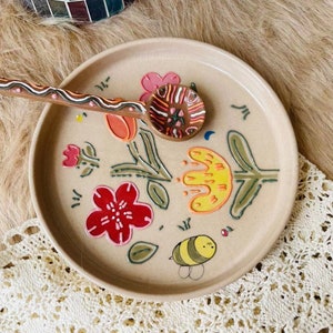 Hand-Painted Flower and Bee Ceramic Plate - Unique Handcrafted Design for Nature Lovers