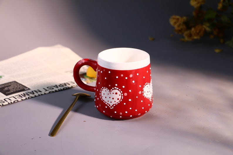Eco-friendly red mug perfect for coffee or tea.