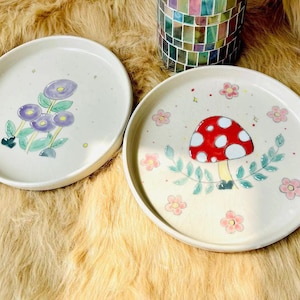 Handcrafted Red Mushroom Ceramic Plate with Purple Flowers - Artisan Home Decor - Customizable Plate for Nature Lovers