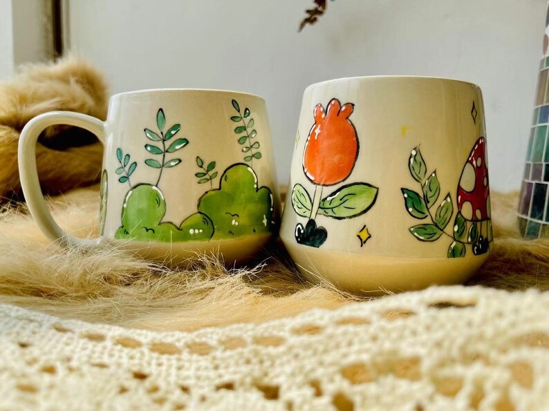 Unique handmade ceramic mug with nature-themed designs