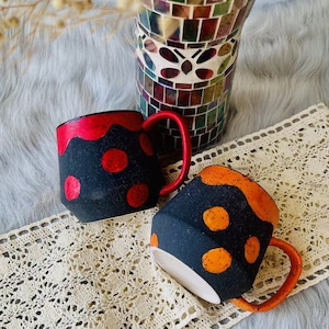 Handmade Ceramic Mug – Black with Bold Red & Orange Dots, Unique Pottery Cup for Coffee and Tea Lovers