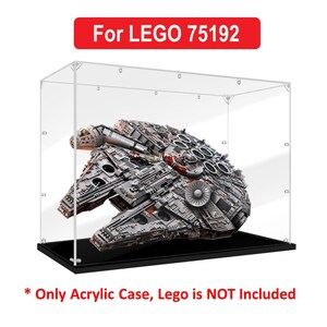 May include: Clear acrylic display case for LEGO Star Wars Millennium Falcon (75192). The case has a black base and is designed to protect and showcase the model. *Only Acrylic Case, Lego is NOT Included*