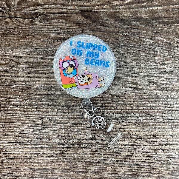 Two Inch Round Bluey Inspired Badge Reel; Slipped on my beans; Interchangeable Option; Acrylic Beaded; Glittered; Heeler; Grannies