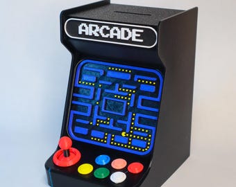 レトロなアーケード貯金箱。楽しい貯金箱。ユニークなゲーム装飾