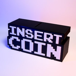 Insert Coin Piggy Bank Retro Arcade-Themed Savings Bank Fun Desk Decor Perfect Gift for Gamers Unique Gaming Accent Game Over Game Start