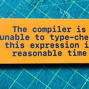 May include: Orange metal bottle opener with a black inscription that reads "The compiler is unable to type-check this expression in reasonable time."