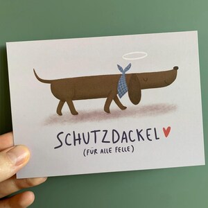 Postkarte Schutzdackel I Karte Grusskarte Schutzengel Dackel Dackelfan Mutmacher Glücksbringer Geschenk Freundin Freund Lustig