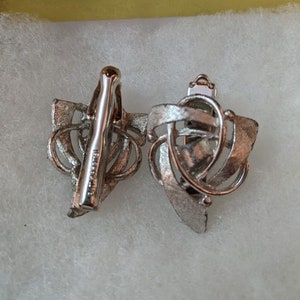 Beautiful pair of vintage costume sweater saver clips