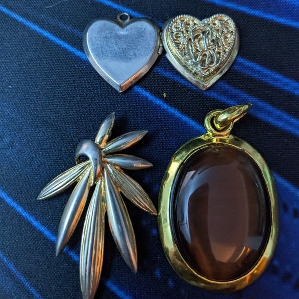 Trio of vintage costume pendants/locket