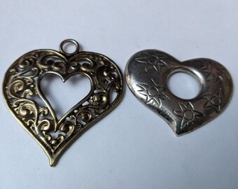 2 Vintage costume silver & gold heart shaped pendants