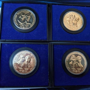 Set of 4 identical 1973 American Revolution Bicentennial coins. Samuel Adams & Patrick Henry