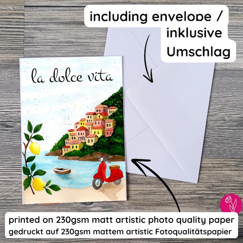 May include: A watercolor greeting card with the words "la dolce vita" and a coastal Italian village scene. The card includes a red scooter, lemons, and a white envelope. Printed on 230gsm matte artistic photo quality paper.