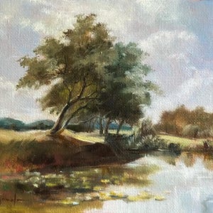 An unframed vintage style print featuring river, trees, and soft blue sky, a fine art reproduction in classical style