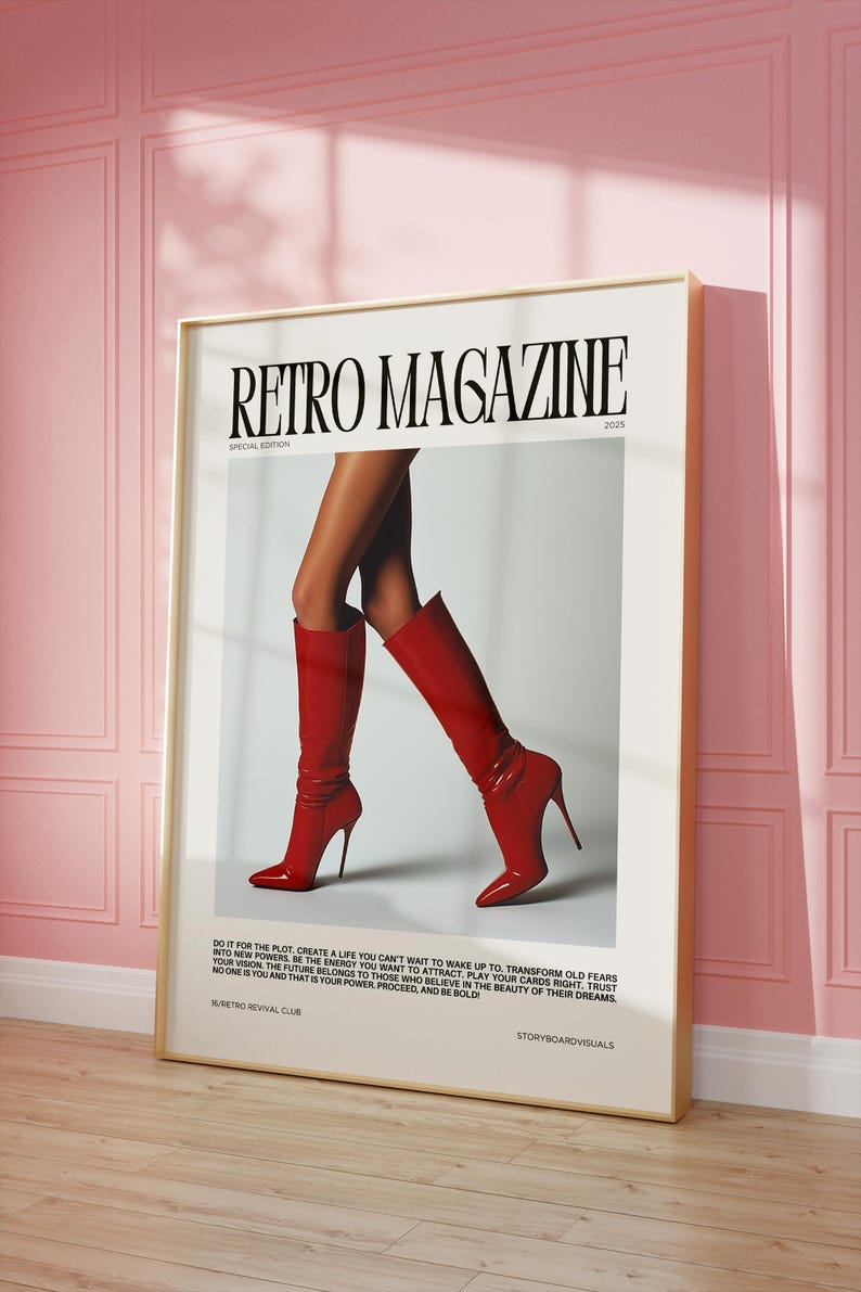 May include: A framed poster with the text "RETRO MAGAZINE" and the year 2025. The image features a pair of legs wearing shiny red high-heeled boots. The poster is displayed against a pink wall.