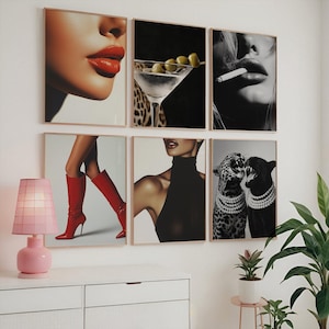 May include: A collection of six framed art prints. The prints feature close-ups of red lips, a martini with olives, a person smoking, red high-heeled boots, a person in a black turtleneck, and two leopards with pearl necklaces.
