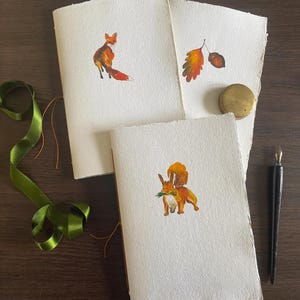 Set of 3 hand-stitched cotton rag books: Hand Stitched Recycled Paper