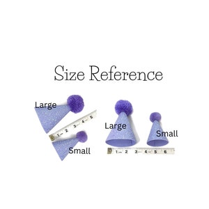 May include: Size reference for party hats. Two purple glitter party hats with white pom-poms are shown next to rulers. The larger hat measures 4 inches in diameter and the smaller hat measures 3 inches in diameter. The text "Large" and "Small" is written next to each hat.