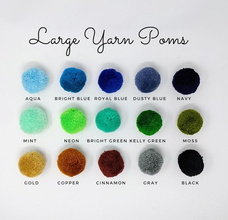 May include: A chart of large yarn pom poms in various colors, including aqua, bright blue, royal blue, dusty blue, navy, mint, neon green, bright green, kelly green, moss, gold, copper, cinnamon, gray, and black.