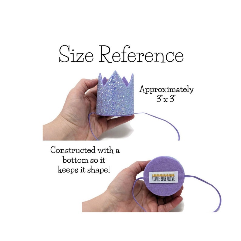 May include: A purple felt crown with a glittery top and a white felt bottom. The crown is approximately 3 inches by 3 inches. The crown is held in a hand and the bottom of the crown is visible. The crown is made by Little Blue Olive.