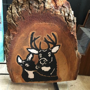 Deer painting on live edge wood cutting