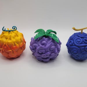 Set of 3 - Gum Gum, Mera Mera no Mi, Yami Yami no Mi Devil Fruit Tobacco Herb Grinder from One Piece Anime