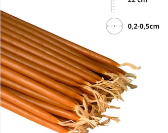 May include: A bundle of 22 cm long, brown beeswax taper candles, each with a diameter of 0.2-0.5 cm. The candles are bundled together and have a natural, rustic look.