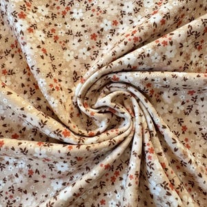Jersey fabric mini flowers beige cotton