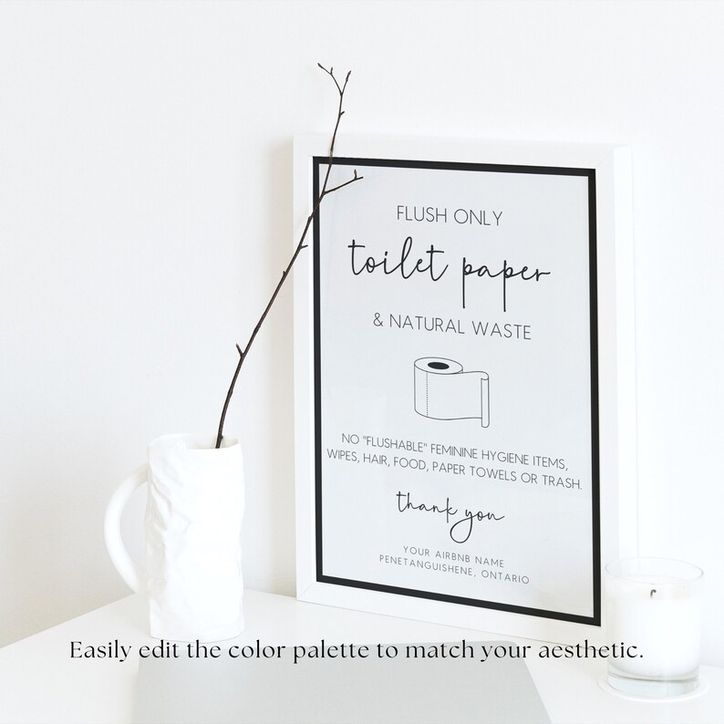 May include: Black and white sign with the text "FLUSH ONLY toilet paper & NATURAL WASTE". A simple illustration of a toilet paper roll is below the text. The sign also includes the text "NO "FLUSHABLE" FEMININE HYGIENE ITEMS, WIPES, HAIR, FOOD, PAPER TOWELS OR TRASH. thank you YOUR AIRBNB NAME PENETANGUISHENE, ONTARIO".