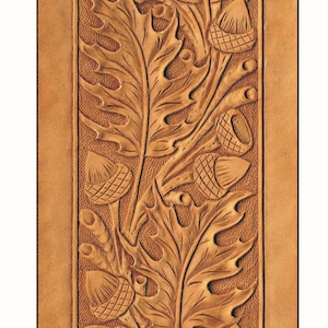May include: A close-up of a leather panel with a tooled design of oak leaves and acorns. The design is in shades of brown and tan.