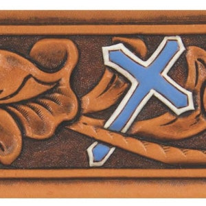 May include: A brown leather belt with a tooled design of flowers and leaves. A blue cross is centred on the belt.