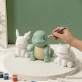 PaintPalz Series® Paintable Pokémon Figurines – Choose Your Character, 50+ Available | Birthday Party Activity | Plant-Based product logo